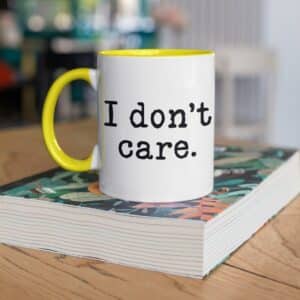 Coole Statement Tasse „I don’t care” mit Goldhenkel